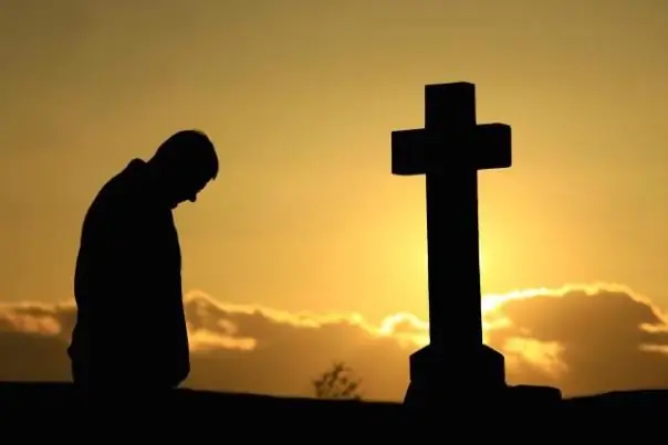 homme à la tombe